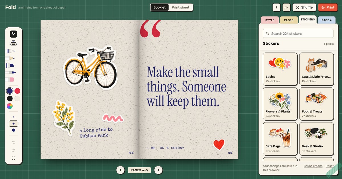 Fold, a zine open to a spread with a bicycle sticker, a typed note and a quote, beside its sticker packs